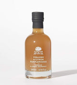 A L'Olivier Essig mit Zitrone und Grapefruit, 200ml Flasche vor hellem Hintergrund – fruchtig-frische Essigspezialität für Salate, Fischgerichte und sommerliche Dressings
