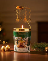 Collines de Provence brennende Duftkerze Tannenwald mit goldenem Rentier-Karussell, Tannenzweig und Weihnachtsdekoration