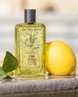 Durance Eau de Toilette Homme Citron Corse 100 ml Flakon mit frischer Zitrone und Wassertropfen inszeniert