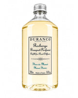 Durance Raumduft Nachfüller Monoi-Blume, 500ml Plastikflasche mit goldfarbener Duftflüssigkeit und silbernem Schraubverschluss