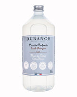 Durance Waschmittel Baumwollblüte Flasche mit hellblauem Etikett auf weißem Hintergrund