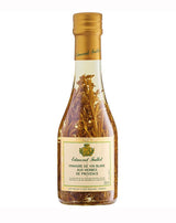 Edmond Fallot Weißweinessig mit Kräutern der Provence in 250ml Glasflasche mit eingelegten Kräutern und goldener Kapsel