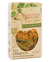 Produktbild der Biscuiterie de Provence „Les Croquets – Pistou & Parmesan AOP“: Verpackung mit Basilikum- und Käseillustrationen sowie Sichtfenster mit knusprigen Aperitif-Brotscheiben mit Mandeln