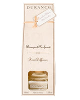 Durance Raumduft Diffuser Weiße Kamelie 100ml in cremefarbener Geschenkverpackung mit Sichtfenster und White-Camellia-Anhänger vorne dargestellt